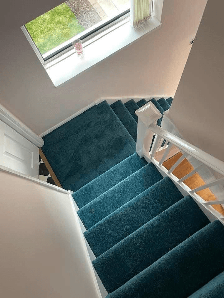 Teal carpet fitted on staircase